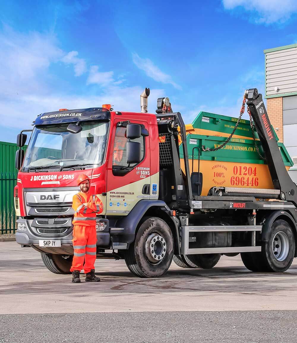 driver stood next to lorry