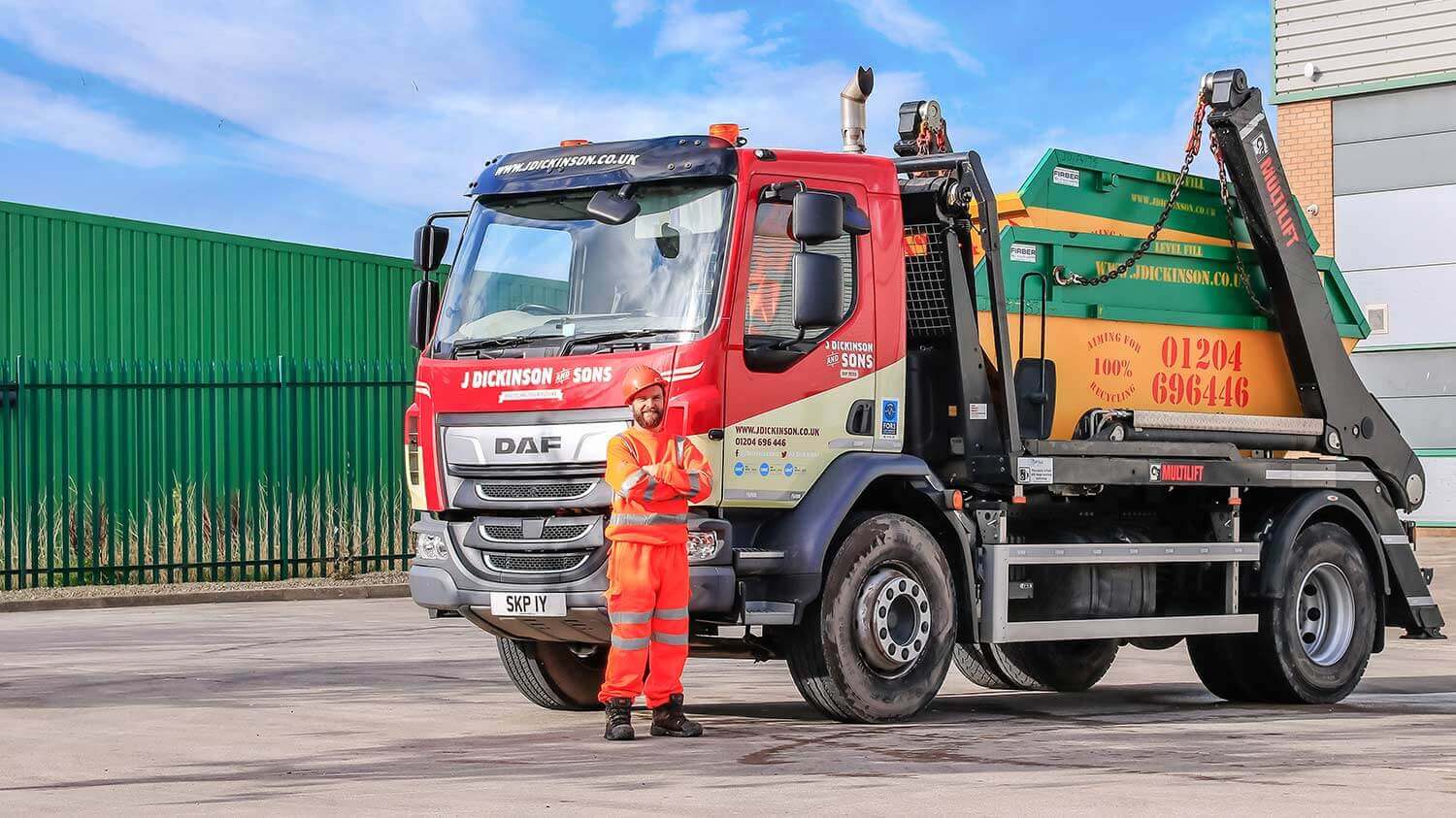 driver with skip truck